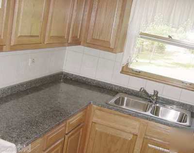 Polished granite slabs counter top 1.25â€ thick gray cut