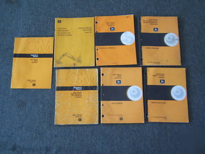 Lot john deere backhoe parts, operator and tech manuals