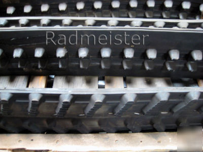 A set of 2 rubber tracks for camisa, fercad, sato