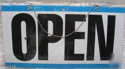 New blue open closed business sign will return clock 